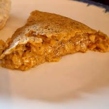 Ración de tortilla de Kuman con relleno de setas, vista cenital, Torrelavega.